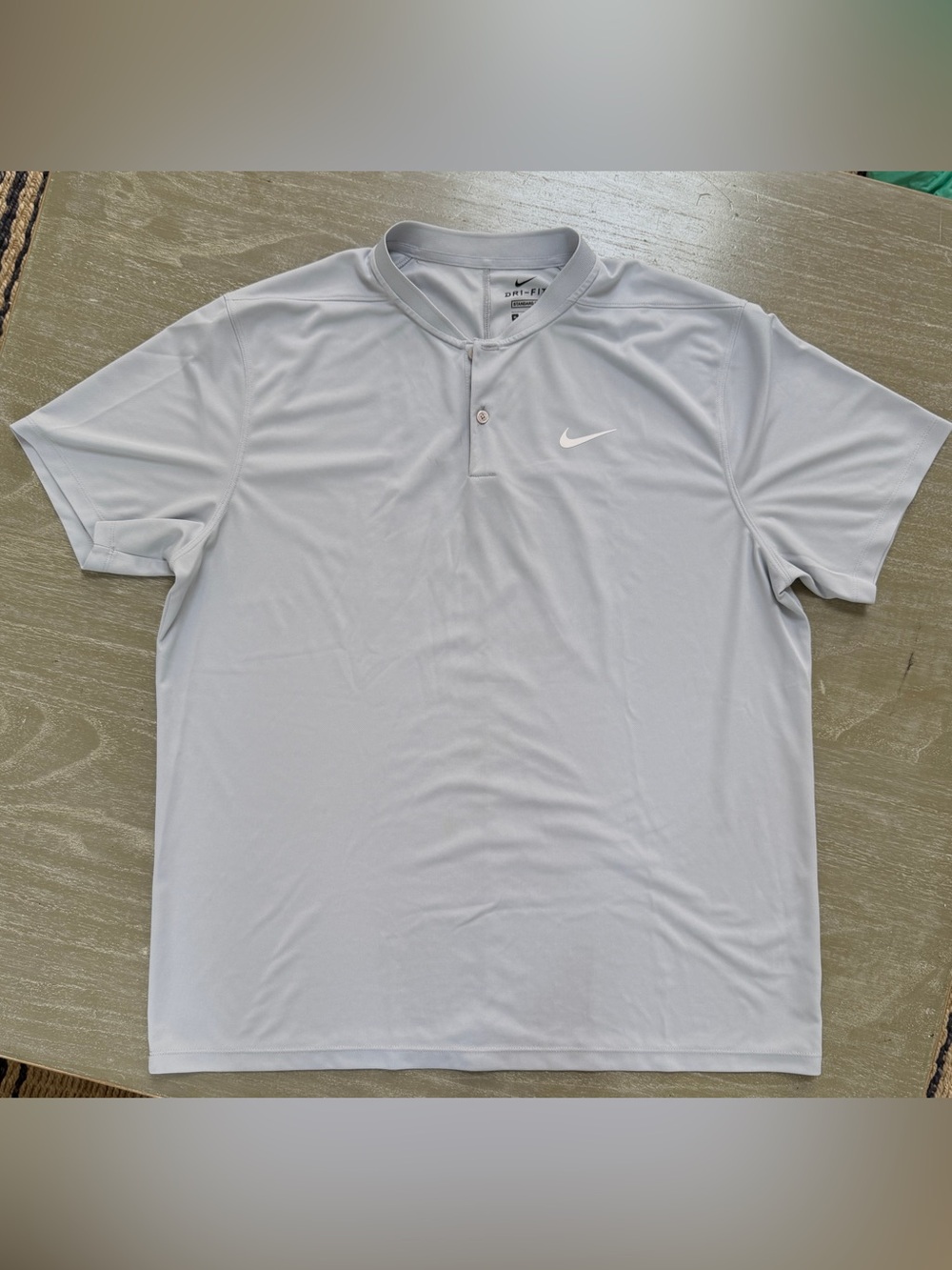 Nike Men’s Golf Dri-Fit Gray shirt.  Standard Fit. Size XL. New with tags.